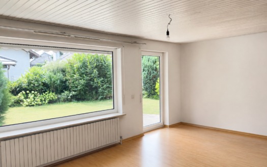Familienfreundliches Wohnhaus mit Dachstudio, Süd-Balkon & Einzelgarage in Eichenau